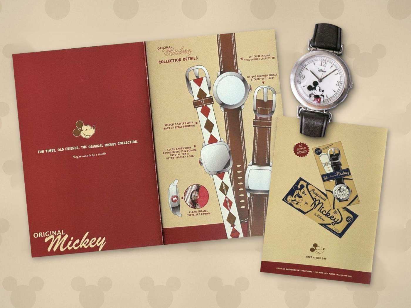 Inside cover spread of the Original Mickey red booklet, beside the booklet back cover showing the Original Mickey packaging, with a silver Disney Mickey Mouse watch above it