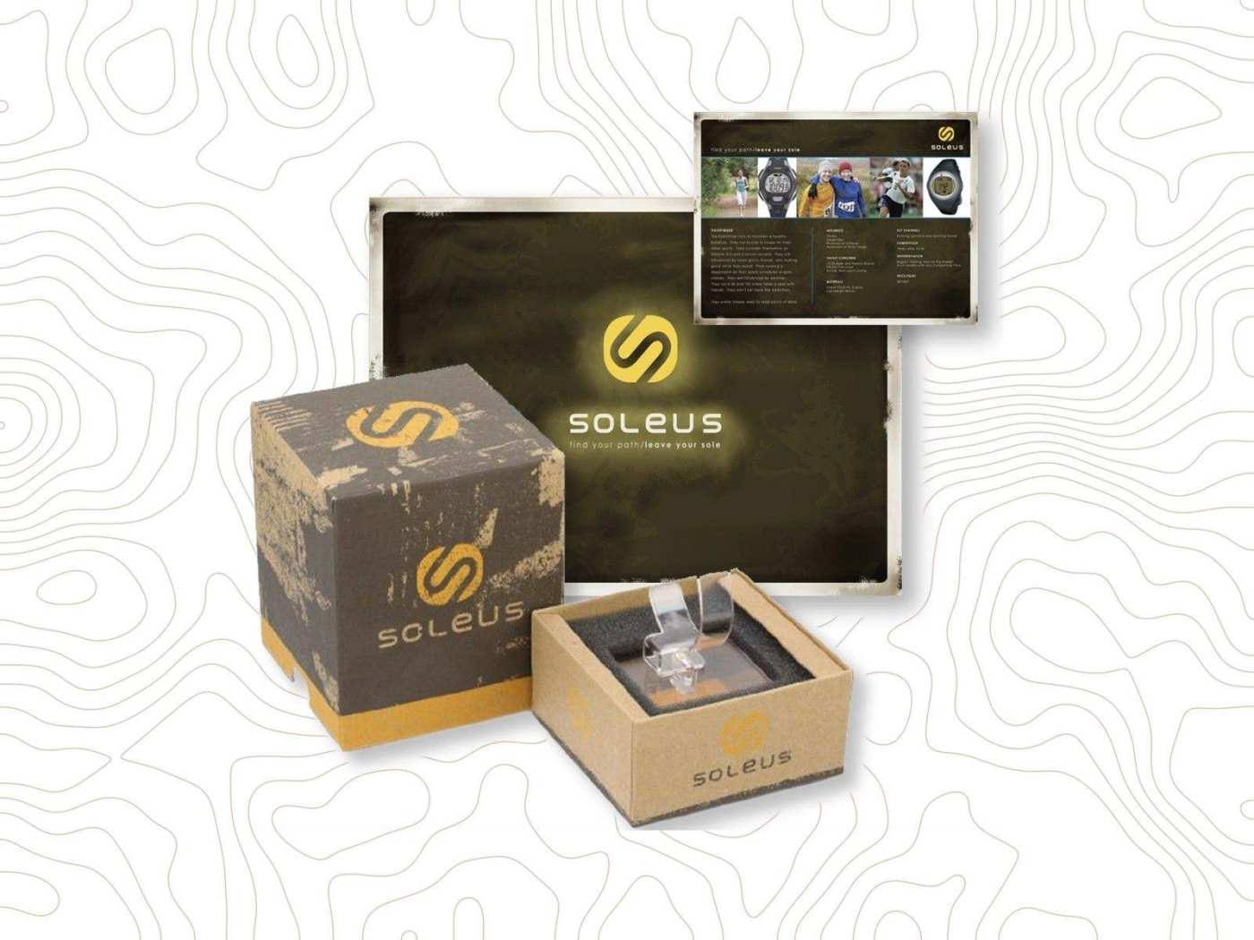 Soleus Running packaging and brand materials: the printed gift box, the open kraft watch box and the brand presentation boards