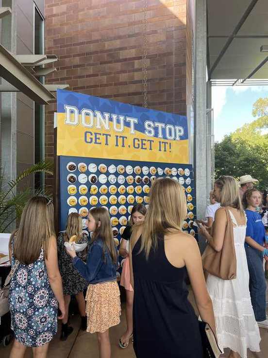Back to School Blessing donut stop wall at the event