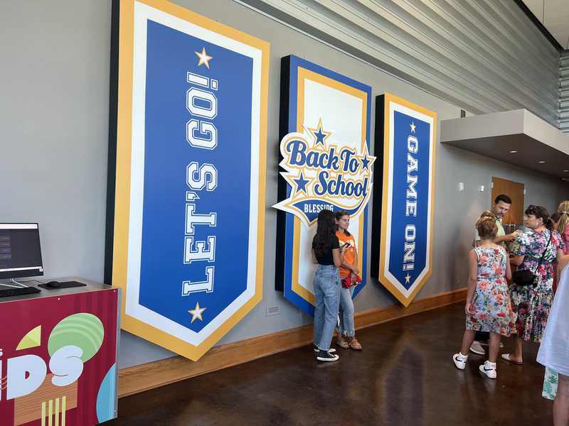 Back to School Blessing lobby banners at the event